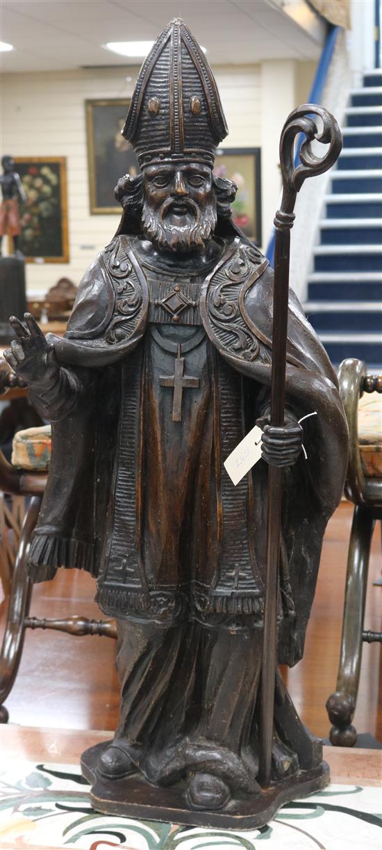 A Spanish carved wood figure of a saint, 19th century, height 98cm